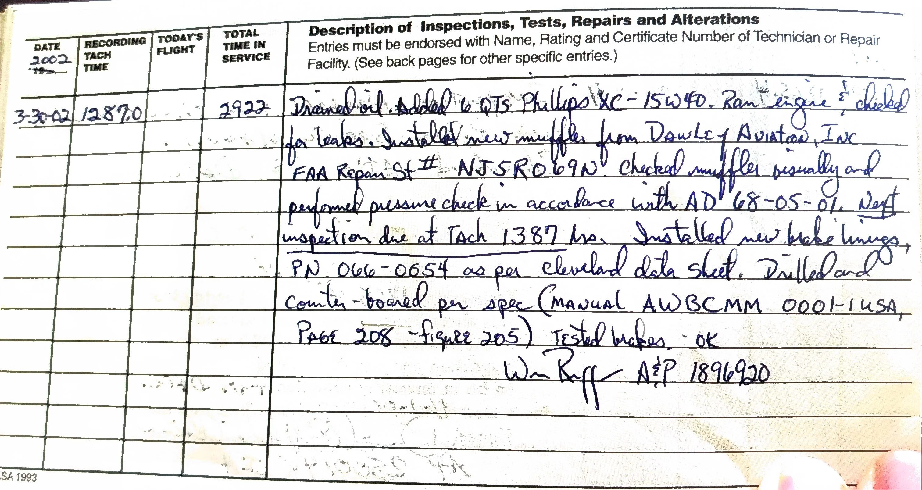 A handwritten aircraft logbook page showing maintenance entries